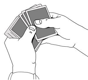 mallikuva pelikorteista taikurin käsissä
